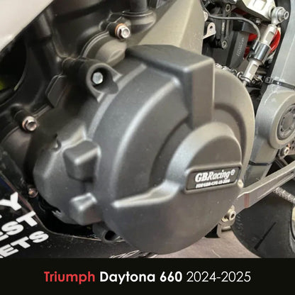 Close-up of a motorcycle engine cover with 'GBRacing' branding on a Triumph Daytona 660 2024-2025 motorcycle.