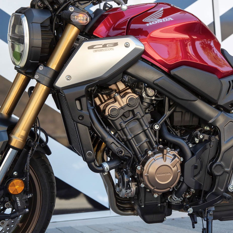 Close-up of a Honda motorcycle with red and black color scheme