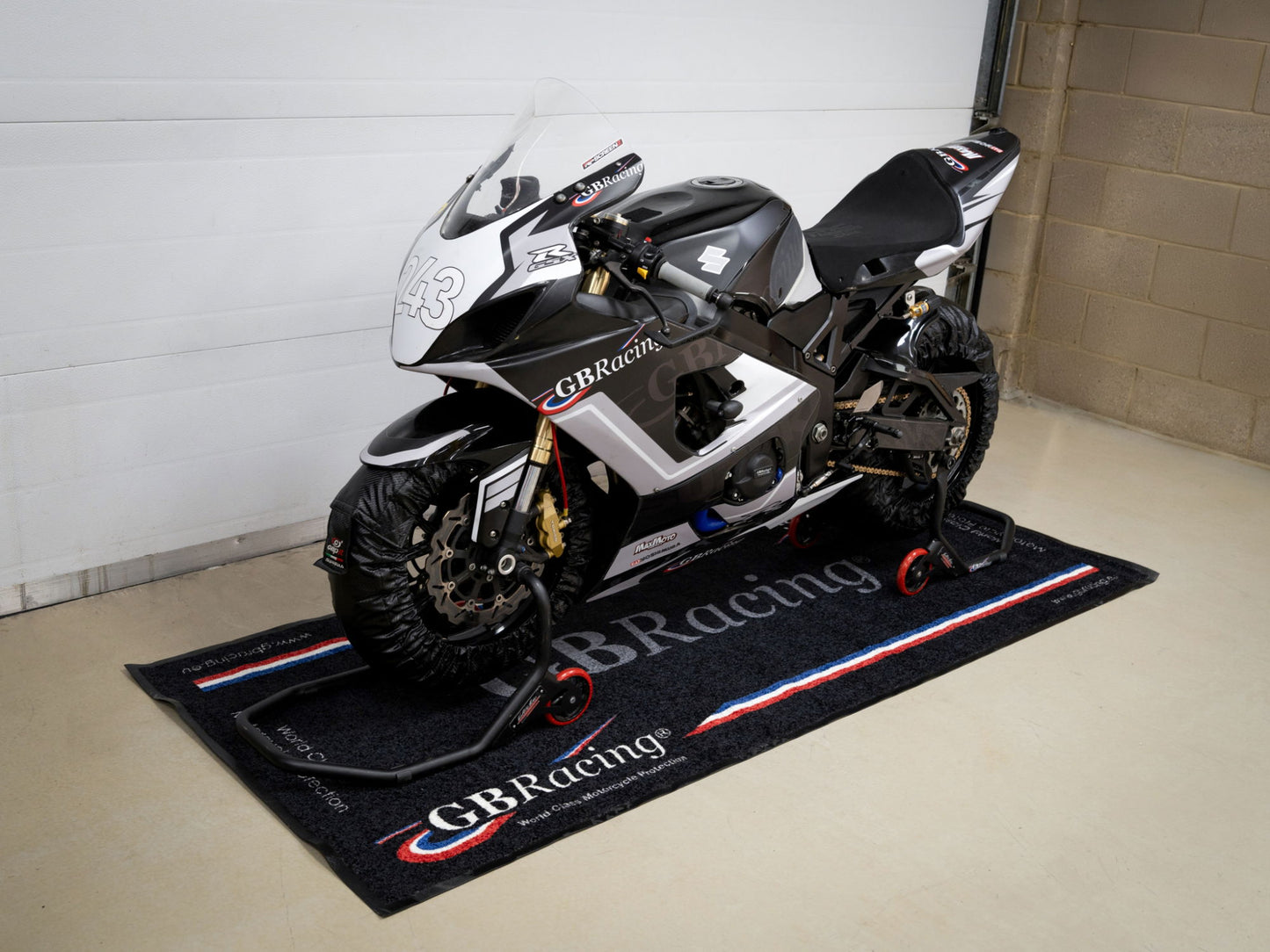 Motorcycle on a GBRacing mat in GBRacing factory