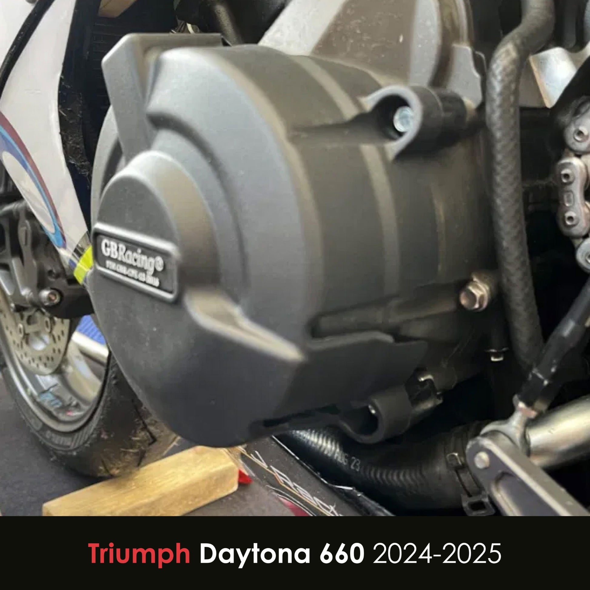 Close-up of a motorcycle engine cover with 'GBRacing' branding, on a Triumph Daytona 660 2024-2025 motorcycle.