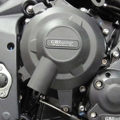 Close-up of a GBRacing engine cover on a Triumph bike