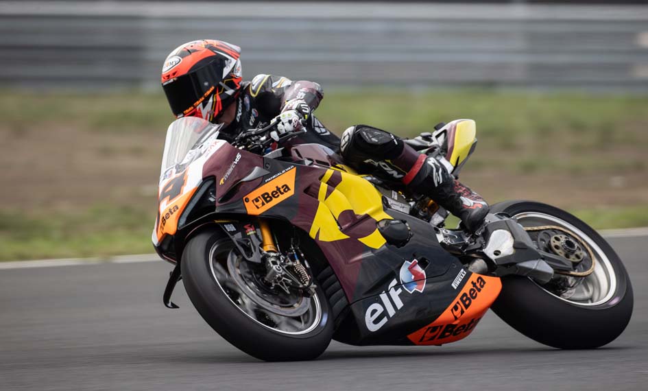 Racing motorcycle with rider on a track