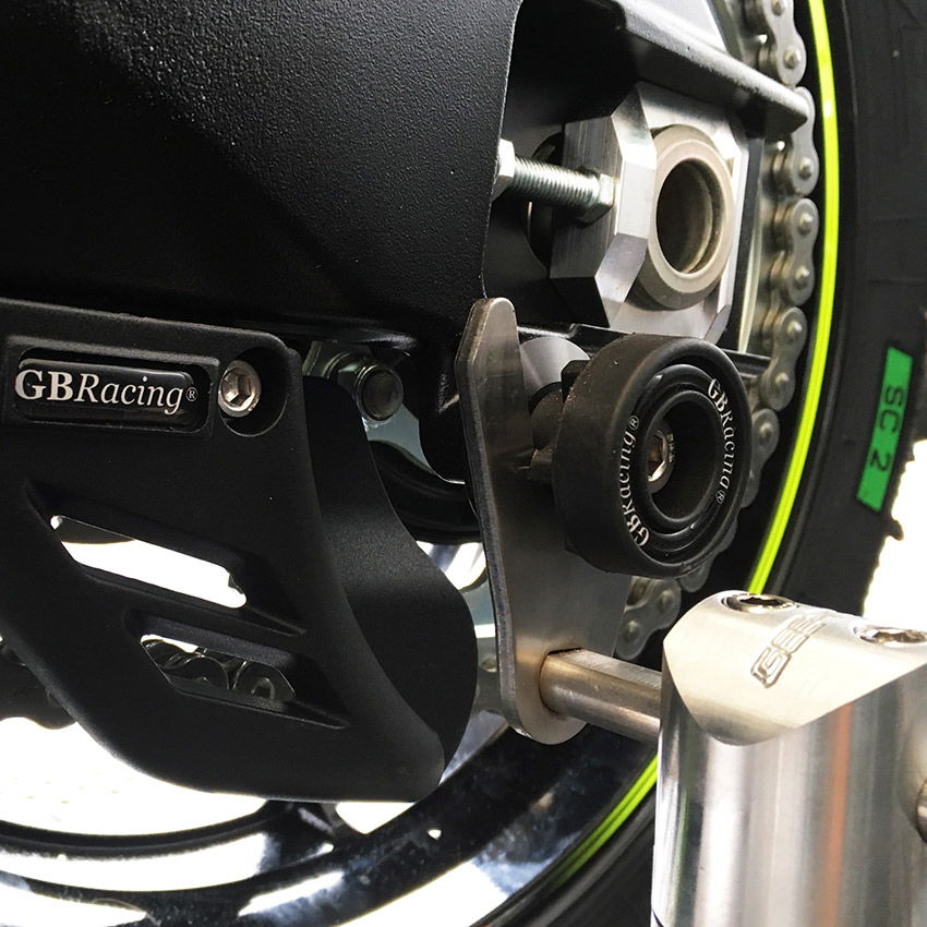 GBRacing Paddock stand bobbin with chain guard